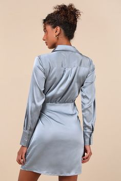 You'll be ready for the art gallery when you slip into a stunning look like the Lulus Painterly Perfection Slate Blue Satin Wrap Mini Dress! Sleek woven satin shapes this stunning dress that has long sleeves with button cuffs and a collared neckline. Wrap-style bodice secures at the waist with an internal tie and an external sash tie, atop a flaring skirt with a mini hem. Fit: This garment fits true to size. Length: Mid-thigh. Size medium measures 36.25" from shoulder to hem. Bust: Great for any cup size. Waist: Fitted - very fitted at natural waist. Hip: Not Fitted - room for hips. Undergarments: May be worn with any standard bra. Fabric: Fabric has no stretch. Lined. Shell: 95% Polyester, 5% Spandex. Lining: 100% Polyester. Hand Wash Cold With Like Colors Separately. Do Not Bleach. Line Blue Long Sleeve Wrap Dress, Fitted Long Sleeve Satin Wrap Dress, Blue Satin Long Sleeve Mini Dress, Blue Long Sleeve Shirt Dress With Roll-up Sleeves, Mini Dress Satin, Light Blue Cotton Button-up Shirt Dress, Wrap Mini Dress, Blue Shirt Dress, Mini Wrap Dress