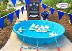 an ice fishing party with paper boats and flags