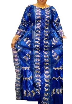 Description: This magnificent custom African dress is perfect for any occasion you want to look your best. It includes 3 pieces (Full dress, wrap-around or Skirt and head-tie).   Important Note: For broderie mix with bazin and garniture mix clothes only: Depending on the availability of the( fabric) / Garnitures (TRIMS) may be different than the one in the pictured. However, the dress will be sewn exactly in the style and colors shown. You can always request to see the fabrics or trims before we Elegant Gold Dress For Fancy Dress Occasions, Royal Floor-length Dress For Festive Occasions, Royal Long Sleeve Fitted Dresses, Royal Floor-length Festive Dresses, Gold Long Sleeve Dress For Fancy Occasion, Gold Long Sleeve Fancy Dress, Royal Style Fitted Fancy Dress, Royal Fitted Dress For Formal Occasions, Royal Fitted Fancy Dress