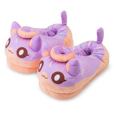 a pair of purple slippers with donuts on them and eyes drawn to the side