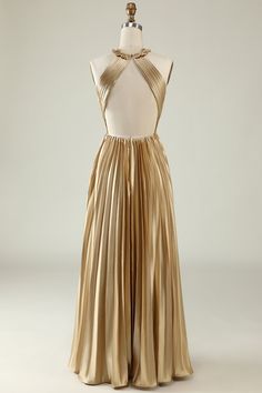 a dress on a mannequin with a halter top and pleated skirt