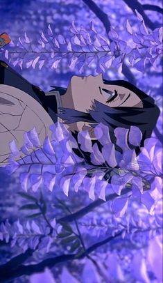 an anime scene with a woman laying on the ground surrounded by purple flowers and leaves