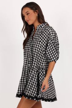 DETAILS  Designed for the fashion-forward woman who appreciates both comfort and style, this mini dress is a versatile addition to your wardrobe. Whether you're pairing it with sandals for a casual day out or dressing it up with heels for a chic evening look.    mini length  high round neckline  short sleeves  functional button down  ric rac trim on hem  gingham print  unlined  material - 100% cotton    SIZING     model is 5' 7" and wears a Size S    model stats: bust - 33", waist - 26", hips - Satin Dresses Long, Satin Dresses Long Sleeve, Black Tie Wedding Guests, White Dress Shoes, Essential Dress, Resort Dresses, Crop Top Tees, Bridesmaid Outfit, Ric Rac