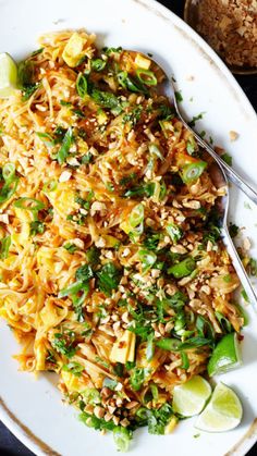 a white plate topped with rice and veggies