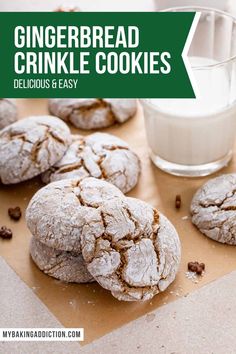 gingerbread crinkle cookies on a table next to a glass of milk