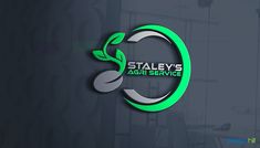 the logo for staley's agri service is shown in green and gray