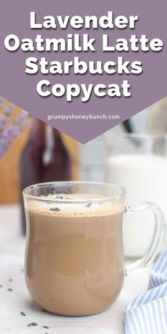 a close up of a cup of coffee on a table with the words lavender oatmilk latte starbucks copycat