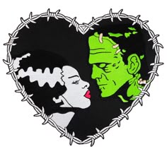 a heart shaped patch with an image of a man and woman