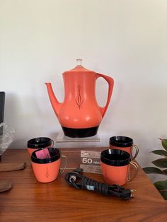 Orange West Bend Fiesta Perk Coffee Percolator Mid Century Kitschy New in Box with 4 cups 10 Cup Perk  This is NEW OLD STOCK, nothing has been used. You will get the box that the coffee pot came in, the 4 cups that match in plastic. This will ship in a priority box 12x12x8.  This is a wonderful for  your vintage home! Retro Coffee Maker, Mid-century Vintage Brown Satchel Bag, Vintage Coffee Percolator, Percolator Coffee Pot, Revere Ware Vintage Coffee Percolator, Coffee Percolator, Percolator Coffee, Tea Makers, Vintage Home