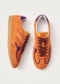 Orange suede sneakers with contrast details Coming in the brightest colors, the Tb.490 sneaker is made from orange suede with purple contrast details. Designed in a low-top silhouette sitting on rubber soles, it’s complete with classic features, including exposed stitching and logo stamps. Purple Contrast, Finnish Fashion, Colorful Sneakers, Orange Sneakers, Vegan Boots, Sustainable Leather, Weekender Tote Bag, Komodo, Dinner Outfits