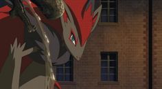 an animated image of a red dragon on the side of a building