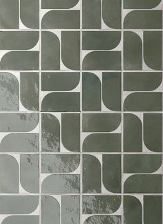 an abstract tile design in grey and white