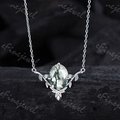 1.5 CT oval moss agate pendant necklace leaf vine green crystal leaf branch necklace nature inspired handmade proposal gifts for women   Product Specifications: 6x8mm oval lab emerald accent stones 2pcs 3x1.5mm moss agate  Chain: 16-18 Inches.  Metal: silver, 14K Or 18K Soild Gold (White, Yellow, Rose)   -See more Engagement rings -You can click on the link www.etsy.com/shop/eFinejewel?section_id=24546904 Ring Size: We can make the ring in any ring size,If the ring size is not in the list,contac Necklace Leaf, Branch Necklace, Agate Pendant Necklace, Proposal Gifts, Wedding Jewellery Necklace, Green Crystal, Agate Pendant, Green Crystals, Moss Agate