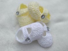 These traditional crochet baby shoes would make a perfect gift for a new born. The crystal buttons add a touch of elegance.  They would make an excellent baby shower present and are ideal for your bundle of joy. These shoes can be made in different colours.   I can custom make these shoes. Please contact me to discuss colour and size.  I always look forward to your custom order requests. I am happy to answer any questions. Every pair of shoes are made to order. I have other baby gift ideas.  Please visit my shop: EbonyStitch. These Classic Baby Shoes are lovingly created for you by EbonyStitch.  Colour: Cream, blue, red, green, mustard, cinnamon, lemon, latte, lilac, white, mink, pink, oatmeal, grey and aqua Material: Soft baby acrylic Size: New born to three months (0 - 3 months) or three Pink Oatmeal, Shoes Crochet, Lilac White, Baby Shower Presents, Crochet Baby Shoes, Crystal Buttons, Gender Neutral Baby Clothes, New Baby Gift, Shoes Baby