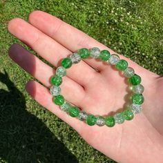 This Is A Handmade Green, And Glass Beaded Bracelet. This Bracelet Is Colorful And Very Pretty. This Would Be A Nice Addition To Almost Any Outfit. This Bracelet Is Fitted And Won't Move Around Much When You Are Wearing It. Handmade, Causal, Feminine, Girly, Green, Glass Beaded, Colorful, Fairy, Fairy Core, Ethereal, Spring, Summer, Cutesy, Cute, Girly, Adorable, Vacation Ethereal Green, Colorful Fairy, Girly Bracelets, Kandi Inspo, Lucite Bracelets, Bones Bracelet, Glass Beaded Bracelet, Brass Cuff Bracelet, Vintage Sterling Silver Charms