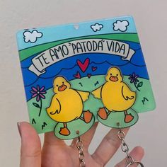 two yellow rubber ducks on a green field with the words teampatoda via