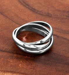 Wear this gorgeous stainless steel ring. The ring has three domed shaped intertwined bands each measuring 3mm. Since bands shift during wear and/or removal we recommend purchasing a size or two up from your normal ring size. | Women's Polished Triple Intertwined Tri Color Stainless Steel Ring | 1-800-Flowers Everyday Gift Delivery Women's Polished Triple Intertwined Ring Women's Polished Triple Intertwined Stainless Steel Ring - Size 3 Coastal Jewelry, Gift Delivery, Everyday Gifts, Stainless Steel Ring, Stainless Steel Rings, Polish Jewelry, Steel Ring, Stone Settings, Metal Stamping