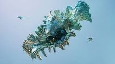 an abstract image of leaves floating in the air with birds flying around on a sunny day