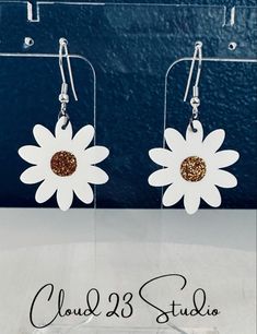 Handmade jelly daisy earrings. Waterproof earrings perfect for spring and summer! Trendy White Plastic Earrings, Trendy White Daisy Shaped Jewelry, Trendy White Daisy-shaped Jewelry, Trendy White Earrings, Handmade White Plastic Earrings, White Resin Earrings For Summer, White Daisy-shaped Hypoallergenic Flower Earrings, White Plastic Jewelry For Summer, White Plastic Summer Jewelry