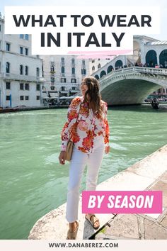 a woman standing on the edge of a bridge with text overlay that reads what to wear in italy by season