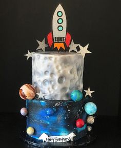 a birthday cake with an outer space theme