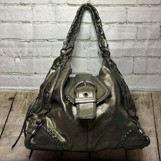 Silver Metallic & Purple Coach Shoulder Bag. No Holes Or Stains. In Good Condition. Look Carefully At The Pictures Below Before Purchasing. See Photos Below For Details. Purple Coach, Bags Coach, Coach Shoulder Bag, Coach Bags, Color Purple, See Photo, Metallic Silver, Shoulder Bags, Bag Accessories