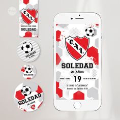 a cell phone with stickers on it next to some buttons and magnets that say soldad