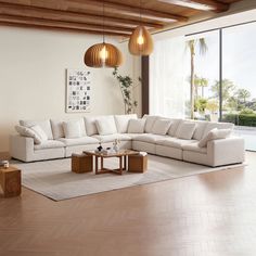 a living room with white couches and wooden tables in front of large glass windows