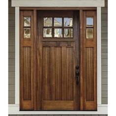 a wooden door with two sidelights and windows