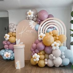 balloons and flowers are on display in the room