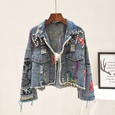 DescriptionAmy Fashion - Street Fashion Graffiti Denim Jacket Size(tops) Shoulder Bust Length Sleeve Onesize 63 112 50 42 window.adminAccountId=233705716;