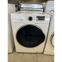 a washer and dryer sitting next to each other