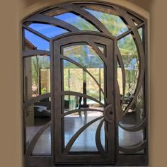 IWD-eleglant-steel-single-entrance-door-clear-glass-CID-128-radiant-curved-line-arched-top-with-transom-sidelights-ironwroughtdoors Single Entrance Door, Wrought Iron Entry Doors, Iron Front Door, Iron Entry Doors, Iron Door Design, Door Sweep, Wrought Iron Doors, Window Accessories, Pivot Doors