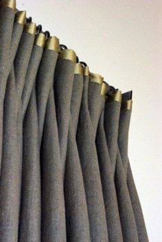 the curtains are lined up and ready for someone to see them in their home or office