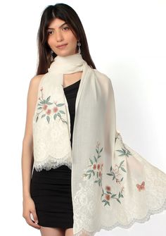 Indulge in the timeless allure and purity of our ivory cashmere scarf. Its delicate multi-colored floral embroidery combined with tonal ivory filigree lace at the ends, creates an exquisite blend of sophistication and uniqueness. This scarf offers both warmth and style, making it a must-have accessory for any occasion. Elegant Beige Floral Embroidered Fabric, Embroidered White Pashmina Dupatta, White Pashmina Dupatta Shawl, White Pashmina Shawl With Resham Embroidery, White Shawl With Embroidered Border, White Embroidered Pashmina Scarf, White Embroidered Pashmina Shawl, Elegant Pashmina Shawl With Embroidered Border For Wedding, White Pashmina Dupatta With Intricate Embroidery