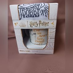 a harry potter coffee mug in a box