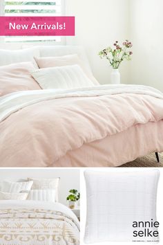 an image of a bed with pink sheets and pillows