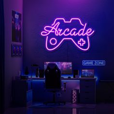 a neon sign that reads arcade and is lit up in the corner of a room