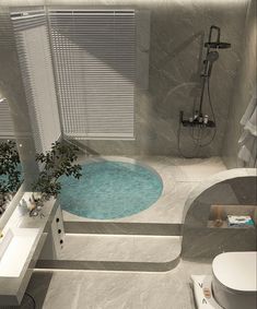 a bathroom with a tub, toilet and sink in it's center area is shown