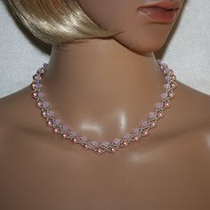 Elegant and extravagant pearl necklace with glass pearls in the colors pink and lilac, hand-threaded. With magnetic closure. This necklace lies wonderfully on the neck, is very light, not a mass product and for all women who love something special. Elegant Pink Beaded Necklaces With Round Beads, Elegant Pink Beaded Crystal Necklaces, Elegant Pink Beaded Necklace With Round Beads, Handmade Pink Pearl Necklace For Wedding, Elegant Pink Single Strand Crystal Necklace, Elegant Pink Crystal Necklaces For Weddings, Elegant Pink Beaded Pearl Necklace, Elegant Pink Pearl Beaded Necklace, Pink Crystal Necklaces For Wedding