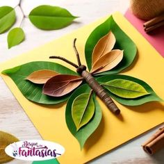 a card with some leaves on it