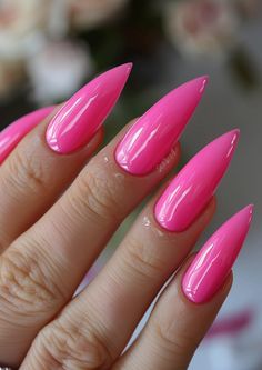 Be bold with these strikingly bright pink stiletto nails that offer a glossy finish, ensuring you make a statement with every gesture. Find more vivid nail designs at nailhow.com. Pink Stiletto Nails, Gel Nail Polish Colors, Salon Nails, Recipes Cookies, Polish Ideas, Pink Out, Nail Envy, Pink Nail Designs, Pink Vibes