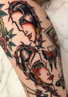 a woman's arm with tattoos on it