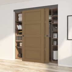 an open door in a white room with wooden flooring and shelves on either side