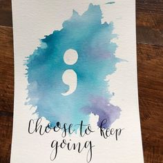 a piece of paper with the words, choose to keep going on it and a watercolor background