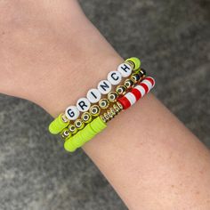 Set of 3, grinch stackable bracelets. Grinch Clay Bead Bracelets, Grinch Bracelet Ideas, Grinch Bracelet, Festive Green Stackable Bracelets, Christmas Themed Bracelets, Grinch Beaded Bracelet, Green Christmas Festive Bracelets, Christmas Jewelry Diy, Holiday Bracelets