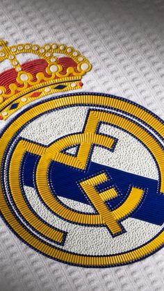 the real madrid and real madrid crests are seen in this file photo taken on march 29, 2013