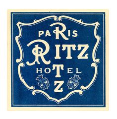 the paris ritz hotel logo is shown in blue and white, with an ornate frame around it