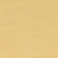 an image of a plain yellow fabric textured with some sort of stain on it