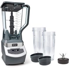 the blender has three cups in it